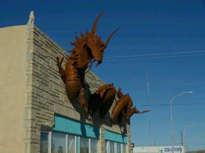 A random dragon coming out of a building. No wonder the place is up for rent